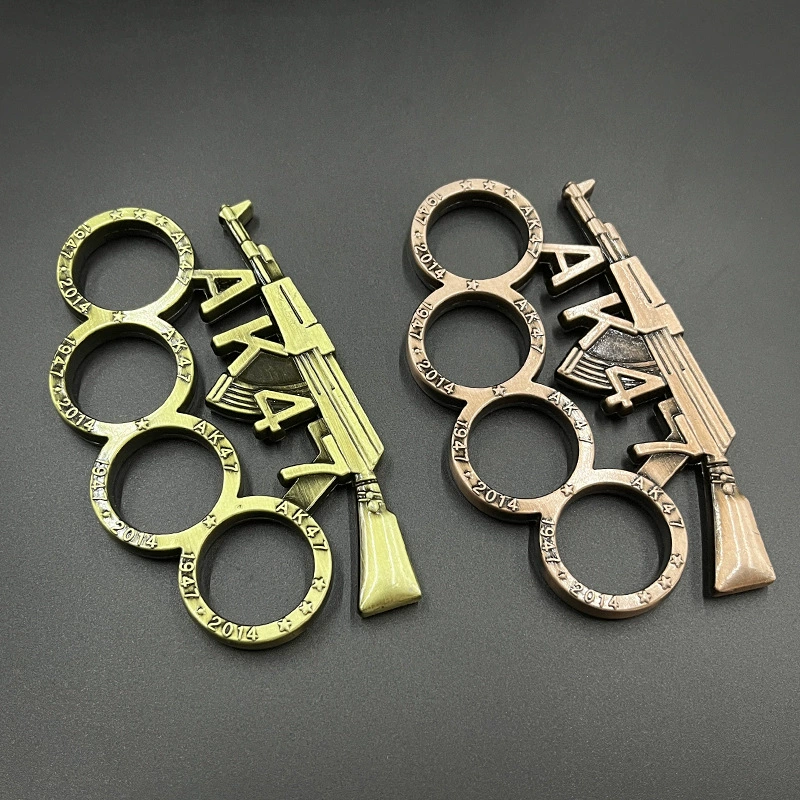 O1CN010XrfG81h1tSxp4Vtj_2212162834218-0-cib.jpg_.webp Car equipment AK47 four-finger tiger hand buckle tiger finger boxing gloves fist buckle travel practice bracelet four-finger ring tiger,schlagring – Bild 1